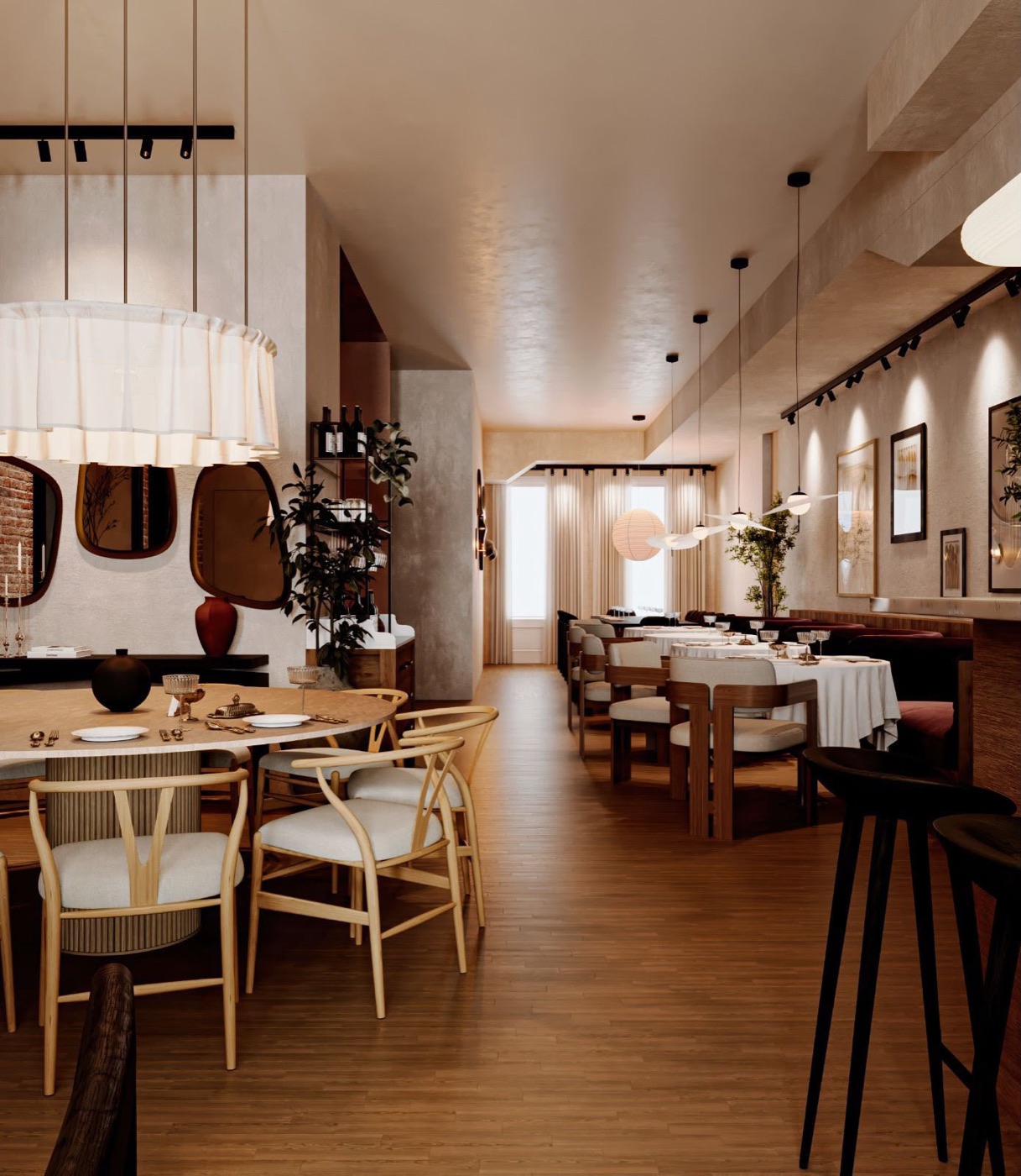 Bright dining hall with wishbone chairs and pendant lighting