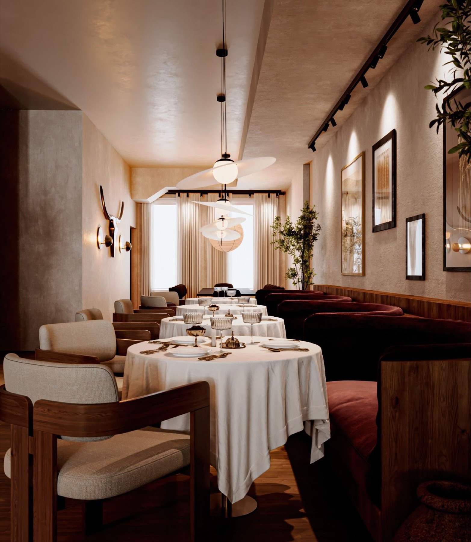 The Sesilya dining room, warm lighting and linen-dressed tables
